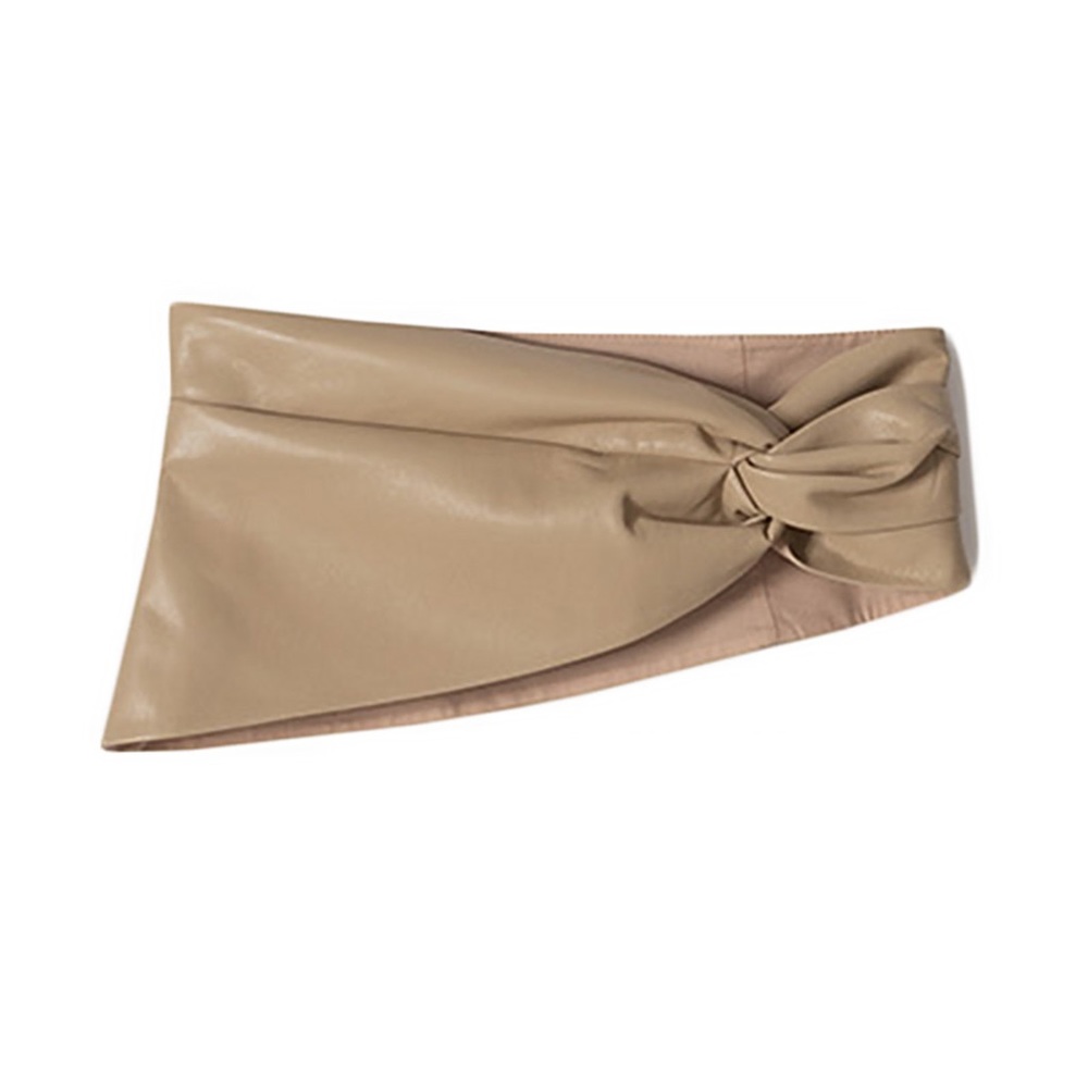Nanushka Antrim twisted vegan leather waist belt in sand